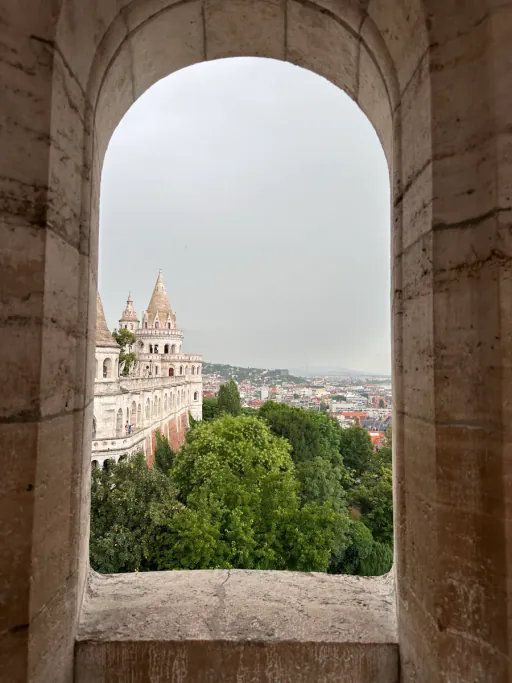 View over Budapest through an arch of the Fisherman's Bastion