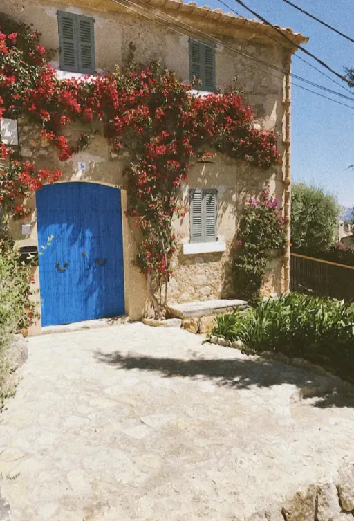 Blue door of a whitewashed Spanish finca