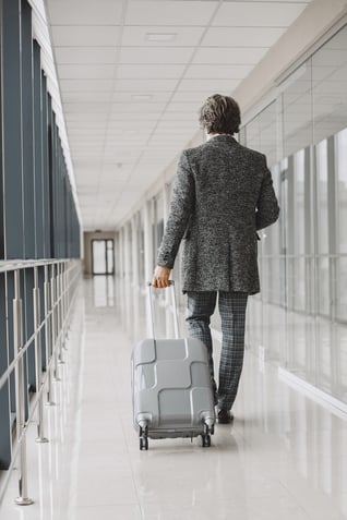 business-trip-corporate-people-concept-male-gray-coat
