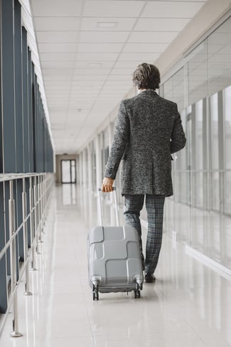 business-trip-corporate-people-concept-male-gray-coat