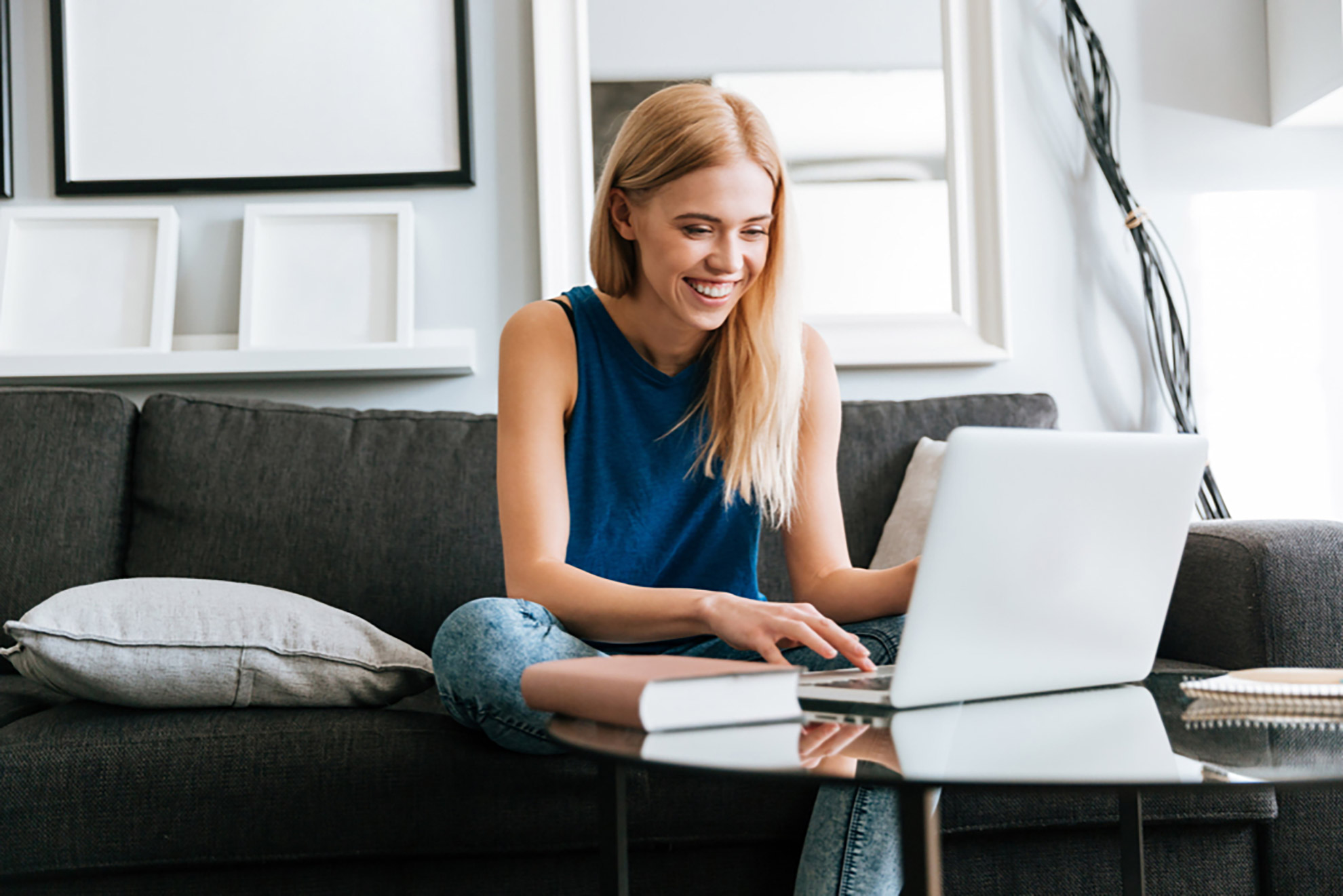 happy-woman-laptop-home