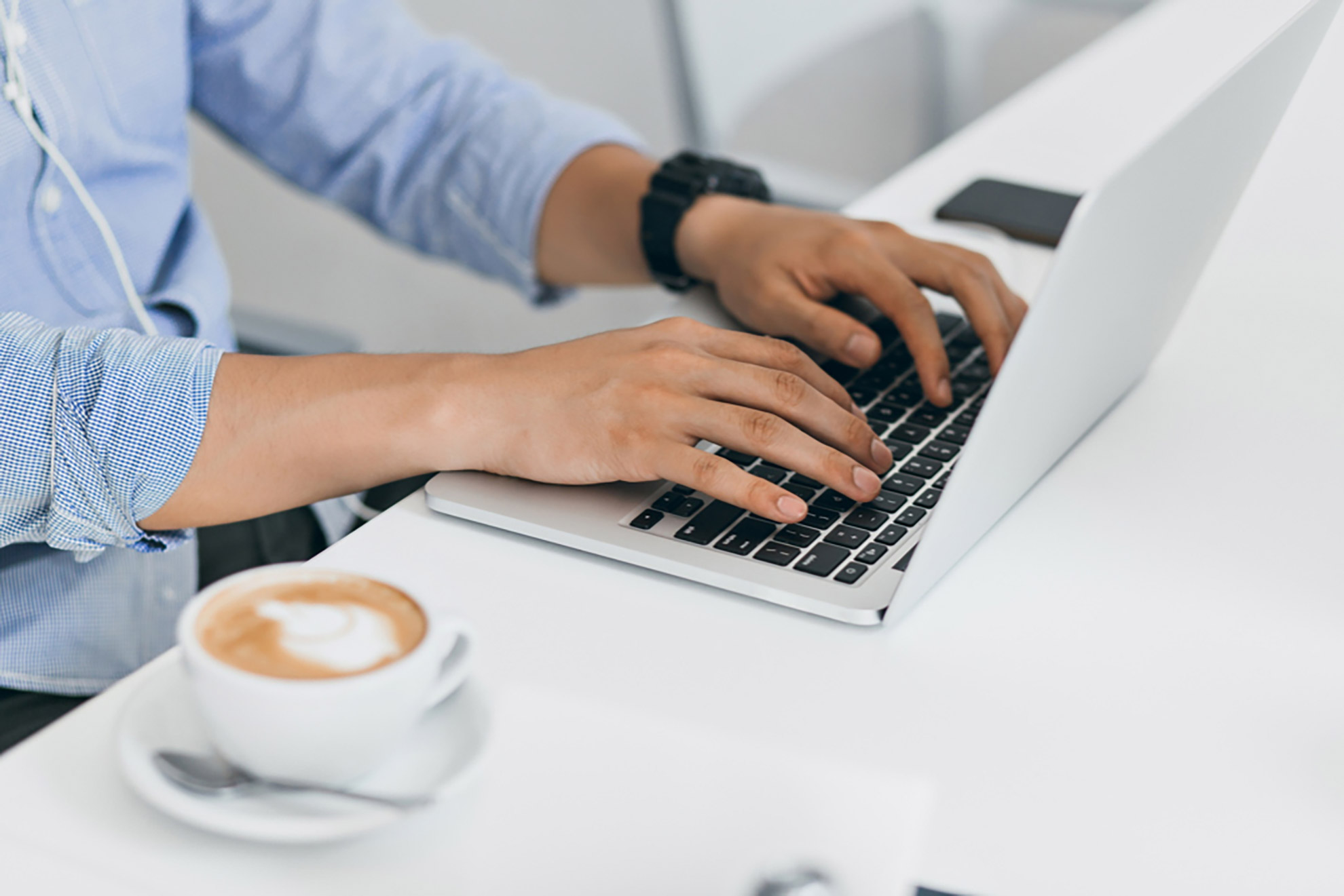 man-blue-shirt-typing