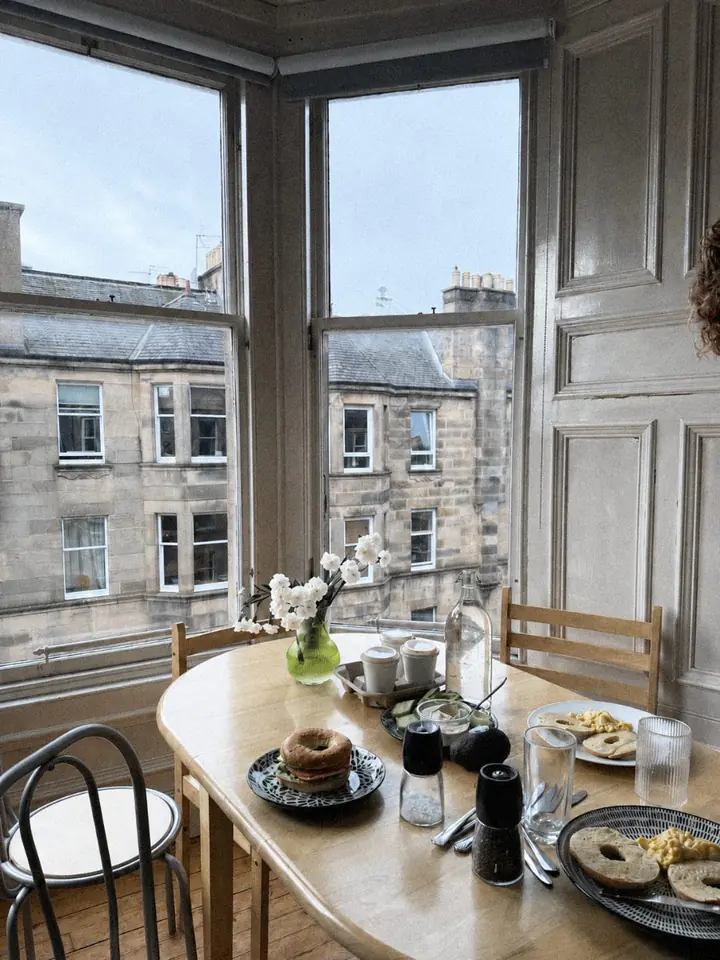 Breakfast table by a bay window